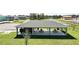Community pavilion featuring picnic tables and chairs for outdoor gatherings at 1163 James Paul Rd, Davenport, FL 33837