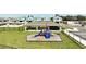 Community playground with a slide and ample space for children to play at 1163 James Paul Rd, Davenport, FL 33837
