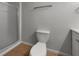 Bathroom features a glass shower and updated fixtures at 1249 12Th St, Clermont, FL 34711