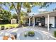 A spacious backyard boasts a patio, offering a great outdoor living space at 125 E Miller St, Orlando, FL 32806