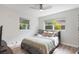 Serene bedroom with a cozy bed, natural light, and peaceful ambiance at 125 E Miller St, Orlando, FL 32806