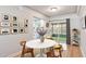 Elegant dining area with sliding glass doors leading to an enclosed patio at 125 E Miller St, Orlando, FL 32806