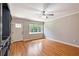 Bright living room with hardwood floors and great natural light at 125 E Miller St, Orlando, FL 32806