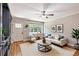 Bright living room with hardwood floors and a neutral color palette, great for entertaining at 125 E Miller St, Orlando, FL 32806