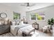 Relaxing main bedroom with ample natural light, a ceiling fan, and cozy decor at 125 E Miller St, Orlando, FL 32806