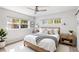 Inviting main bedroom featuring natural light, neutral tones, and comfortable furnishings at 125 E Miller St, Orlando, FL 32806