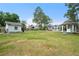 Spacious backyard featuring a shed, gazebo, and well-maintained lawn at 131 Autumn Ct, St Cloud, FL 34771