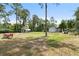 Expansive backyard featuring a gazebo and a shed, perfect for outdoor activities at 131 Autumn Ct, St Cloud, FL 34771