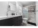 Modern bathroom featuring a double vanity and glass enclosed shower at 131 Autumn Ct, St Cloud, FL 34771