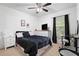 Bedroom featuring a ceiling fan, TV, and an abundance of natural light at 131 Autumn Ct, St Cloud, FL 34771