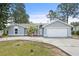 Charming single-story home with a well-manicured lawn, attached two-car garage, and inviting front entryway at 131 Autumn Ct, St Cloud, FL 34771
