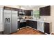 Spacious kitchen features stainless steel appliances and ample cabinet space at 131 Autumn Ct, St Cloud, FL 34771