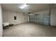 Spacious two car garage with white walls and room for storage at 1360 Twelve Oaks Rd, St Cloud, FL 34771
