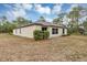 Charming backyard showcases lush shrubbery and a well-manicured lawn at 14066 Sw 60Th Ter, Ocala, FL 34473