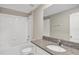 Bathroom with a tub and shower combination and a granite vanity at 14066 Sw 60Th Ter, Ocala, FL 34473