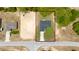 Aerial view of newly built home showing new lawn and surrounding lot at 15296 Sw 56Th Terrace Rd, Ocala, FL 34473