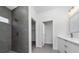 This modern bathroom features a glass-enclosed shower and vanity at 15296 Sw 56Th Terrace Rd, Ocala, FL 34473