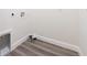 The laundry room has wood-look flooring and utility connections at 15296 Sw 56Th Terrace Rd, Ocala, FL 34473