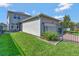 Landscaped backyard with well-maintained lawn and fenced perimeter at 16137 Azure Key St, Winter Garden, FL 34787