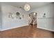 Bright open space with hardwood floors and a modern light fixture at 16137 Azure Key St, Winter Garden, FL 34787