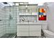 Modern bathroom featuring glass shower with modern vanity and backsplash at 1634 Hull Cir, Orlando, FL 32806