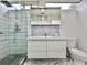 Modern bathroom featuring glass shower with modern vanity and backsplash at 1634 Hull Cir, Orlando, FL 32806