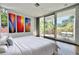 Modern bedroom with bright decor and sliding glass doors to outdoor patio at 1634 Hull Cir, Orlando, FL 32806