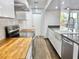 Bright kitchen with modern appliances and sleek countertops at 1634 Hull Cir, Orlando, FL 32806