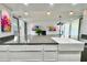 Open kitchen with white cabinetry and modern stainless-steel appliances at 1634 Hull Cir, Orlando, FL 32806
