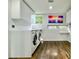 Bright laundry room with modern washer and dryer at 1634 Hull Cir, Orlando, FL 32806