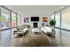 Bright living room features hardwood floors, fireplace, and ample seating at 1634 Hull Cir, Orlando, FL 32806