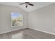 Bedroom with vaulted ceiling, a large window that allows natural light at 1851 Wimbledon St, Kissimmee, FL 34743