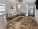 Bright and inviting living room with hardwood floors and neutral decor at 193 Captiva Dr, Davenport, FL 33896
