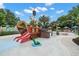 Pirate themed water playground with slides, palm trees, and picnic tables at 193 Captiva Dr, Davenport, FL 33896