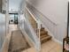 Hallway featuring a staircase with whimsical mouse decals and access to the living area at 193 Captiva Dr, Davenport, FL 33896