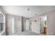 Spacious bedroom featuring carpet flooring, a window, and white trim at 207 Sterling Springs Ln, Altamonte Springs, FL 32714