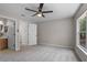 Bedroom featuring a modern ceiling fan, neutral walls, and a window with natural light at 207 Sterling Springs Ln, Altamonte Springs, FL 32714