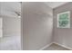Walk-in closet with a wire shelf and a window providing natural light at 207 Sterling Springs Ln, Altamonte Springs, FL 32714