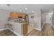 Open concept kitchen featuring granite countertops, breakfast bar and stainless steel appliances at 207 Sterling Springs Ln, Altamonte Springs, FL 32714