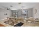 Open-concept kitchen featuring a granite countertop with stainless steel sink and pendant lighting at 207 Sterling Springs Ln, Altamonte Springs, FL 32714
