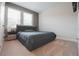 Modern bedroom featuring a comfortable platform bed, soft carpets, and bright windows for a restful night's sleep at 2168 Marsh Sedge Ln, Winter Park, FL 32792