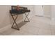 Stylish foyer featuring sleek tile flooring and a decorative console table, creating a welcoming entrance at 2168 Marsh Sedge Ln, Winter Park, FL 32792