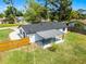 Aerial view of home featuring backyard, patio, new roof, and fenced perimeter at 2412 Yule Tree Dr, Edgewater, FL 32141