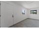 Unfinished basement features ceramic tile flooring, bright light and egress window at 2412 Yule Tree Dr, Edgewater, FL 32141