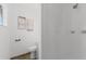 Bathroom featuring ceramic tile floor, white walls, and shower at 2412 Yule Tree Dr, Edgewater, FL 32141