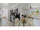 Bright living room featuring stainless steel appliances, and modern furniture at 2412 Yule Tree Dr, Edgewater, FL 32141