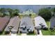 An aerial view of the home, backyard, and tranquil lake is perfect for serene waterfront living at 2889 Blooming Alamanda Loop, Kissimmee, FL 34747