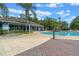 Inviting community pool with spa access, a clubhouse, and plenty of space for relaxation at 2952 Lucayan Harbour Cir # 106, Kissimmee, FL 34746