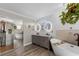 Bright bathroom featuring double vanity, soaking tub, and access to the walk-in closet at 30 Capistrano Dr, Ormond Beach, FL 32176