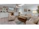 Cozy living room featuring built-in shelving, fireplace, neutral furniture, and a comfortable atmosphere at 30 Capistrano Dr, Ormond Beach, FL 32176